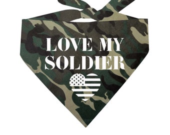 May include: A green camouflage bandana with the text "LOVE MY SOLDIER" in white letters and a white heart with an American flag design.