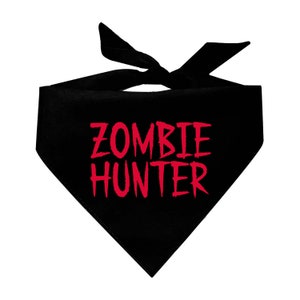 May include: Black bandana with the text "ZOMBIE HUNTER" in red.