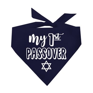 May include: A navy blue bandana with the text "my 1st Passover" in white. A white Star of David is centered below the text.