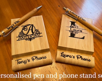 Personalised engraved wooden pen and phone stand set.