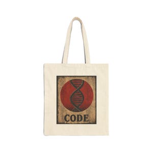 Peut inclure: Un sac fourre-tout en toile beige avec une impression graphique rectangulaire. Le motif présente un cercle rouge foncé contenant une illustration noire d'une double hélice d'ADN, avec le mot CODE imprimé en lettres capitales noires.