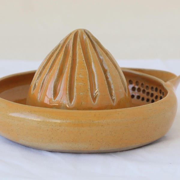 handmade ceramic citrus juicer with sieve