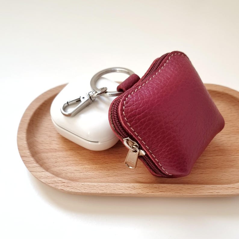 Burgundy AirPods leather case with zipper and hook, perfect for gift. Handmade with full grain leather