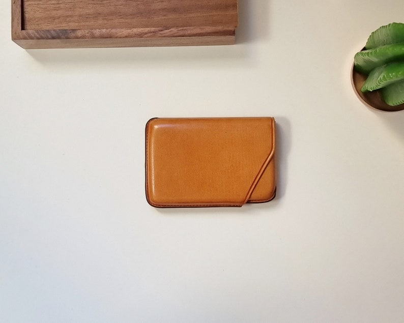 Leather card sleeve perfect as a gift for men. This card holder is a high quality card holder with excellent finishes.