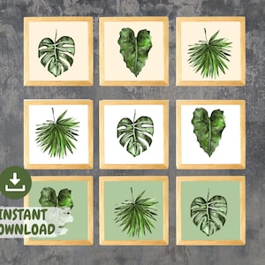 May include: Set of nine printable digital art prints featuring watercolor illustrations of tropical leaves in various shades of green. The prints are framed in a simple wooden frame and displayed against a gray background.