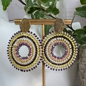 Gold Circle Dangle Earrings: Elegant Statement Jewelry