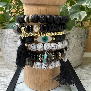 Boho Chic Evil Eye Bracelet Set: Gold, Black, & Clay Bead Stackable Bracelets