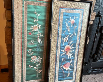 pair of vintage Chinese hand-embroidered silk panels, framed in black bamboo-style frames