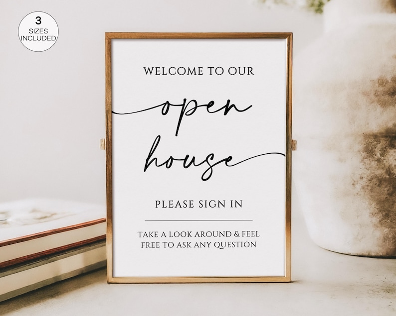 May include: A framed sign with gold trim and white background. The sign reads "WELCOME TO OUR open house PLEASE SIGN IN TAKE A LOOK AROUND & FEEL FREE TO ASK ANY QUESTION." A small circle in the upper left corner says "3 SIZES INCLUDED."