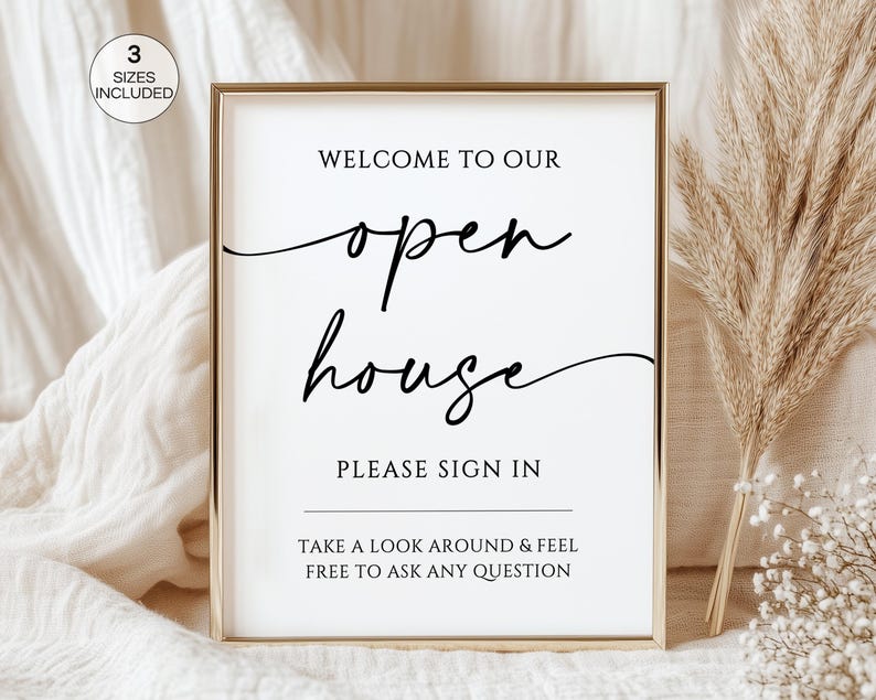 May include: A framed sign with the text "WELCOME TO OUR open house PLEASE SIGN IN" in black script. The sign also includes the text "TAKE A LOOK AROUND & FEEL FREE TO ASK ANY QUESTION". A small circle in the upper left corner says "3 SIZES INCLUDED".
