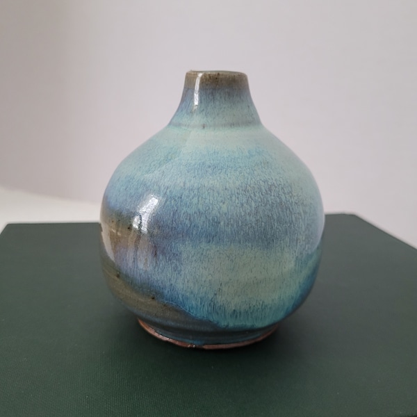 Small hand thrown pottery vase