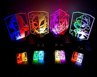 Lámpara LED de ambiente de dos colores + 2 llaveros iluminados / Tema de película, cómic, anime o Navidad