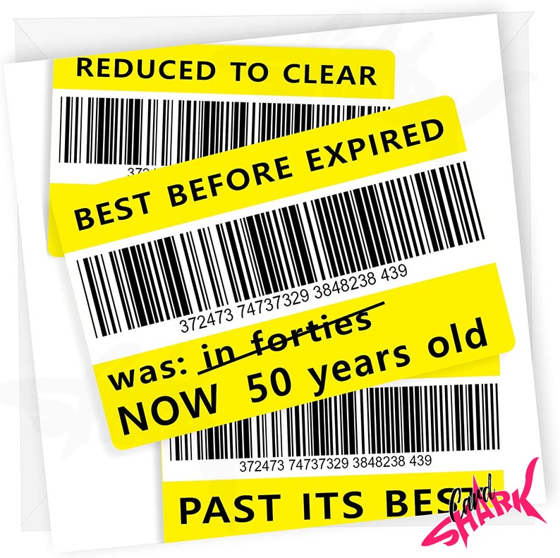 May include: A yellow and black barcode sticker with the text "BEST BEFORE EXPIRED" and "REDUCED TO CLEAR". The barcode number is 372473 74737329 3848238 439. The sticker also has the text "was: in forties" with a line through "forties" and the text "NOW 50 years old". Another yellow and black barcode sticker with the text "PAST ITS BEST" and the same barcode number is visible below the first sticker.