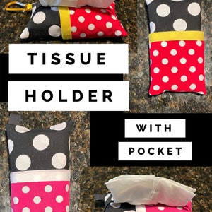 May include: A black and white polka dot fabric tissue holder with a red and white polka dot pocket. The holder has a yellow trim and a black strap with a metal clip. "Tissue Holder with Pocket" is written in white text on a black background.