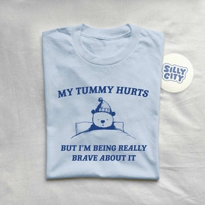 My Tummy Hurts But I'm Being Really Brave About It Unisex T Shirt image 4
