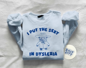 I Put The Sexy In Dyslexia - Unisex Sweater