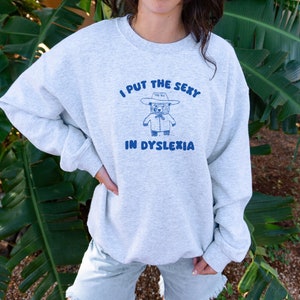 I Put The Sexy In Dyslexia Unisex Sweater afbeelding 4