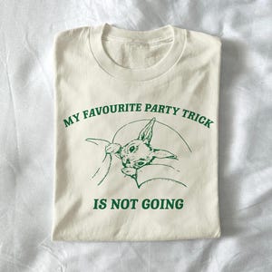 my favourite party trick is not going - unisex t shirt, introvert meme, funny shirt, retro graphic tee, bunny shirt, relatable tee