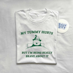 My Tummy Hurts But I'm Being Really Brave About It Unisex T Shirt image 2