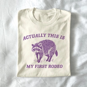 actually this is my first rodeo - unisex t shirt, raccoon t shirt, funny raccoon, meme t shirt, silly t shirt, possum t shirt