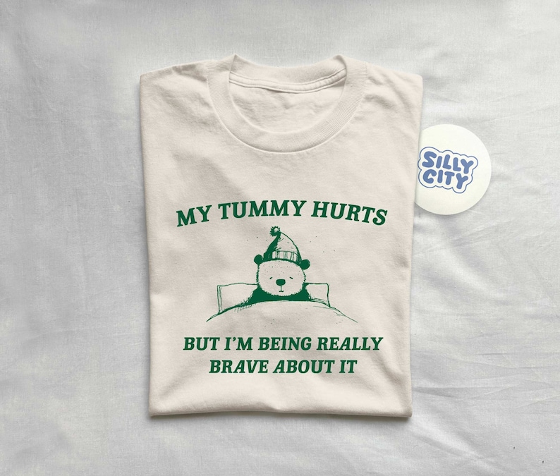 My Tummy Hurts But I'm Being Really Brave About It Unisex T Shirt image 1