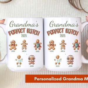 May include: Two white ceramic mugs with the text "Grandma's PERFECT BATCH 2025" in green and red. Each mug features gingerbread people with names. The bottom of the image has the text "Personalized Grandma Mug".