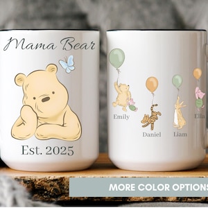 White ceramic mug with black handle featuring Winnie the Pooh and friends holding balloons, personalized with children's names and “Mama Bear” text