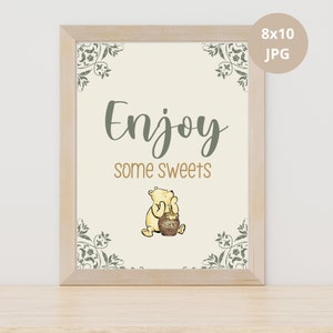 May include: A printable 8x10 inch sign with a Winnie the Pooh illustration. The sign says "Enjoy some sweets" in green text with a decorative border.
