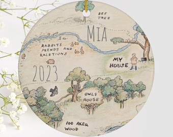 May include: A hand-drawn map of a fictional woodland with the name "MIA" written in cursive. The map includes locations like "Bee Tree", "My House", "Owls House", and "100 Aker Wood". The year 2023 is written in the lower left corner.
