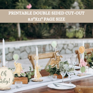 Puede incluir: Recortes imprimibles para centros de mesa de baby shower de Winnie the Pooh. Los recortes muestran a Winnie the Pooh, Tigger, Piglet y Rabbit sosteniendo globos. Los recortes miden 8,5 pulgadas por 11 pulgadas y son de doble cara. El texto "Oh Baby!" está en un letrero redondo.