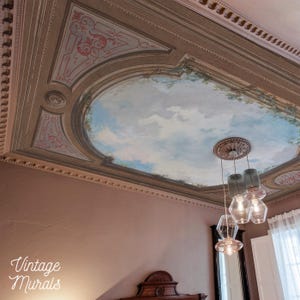May include: A detailed view of a painted ceiling with a sky mural and decorative trim. The ceiling features a central oval with a blue sky and cloud design, surrounded by ornate architectural details. The text "Vintage Murals" is in the bottom left corner.