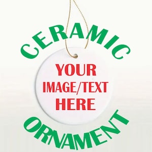 May include: White ceramic ornament with a green "CERAMIC ORNAMENT" border and a red "YOUR IMAGE/TEXT HERE" message in the centre. A gold string is included for hanging.