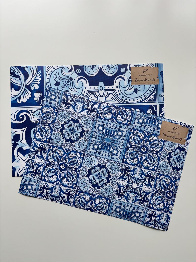 May include: Two sheets of blue and white patterned wrapping paper with a brown label that reads "Vintage Tile, Bazaar Murals, 67".