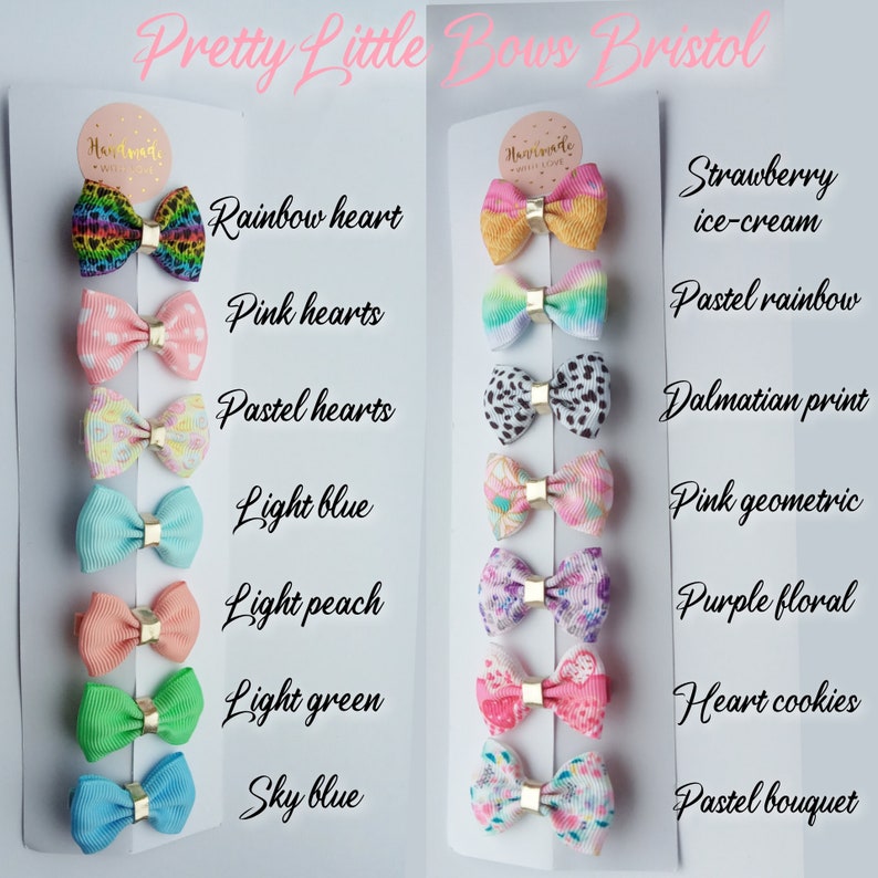 May include: A set of 10 handmade hair bows with various patterns and colors, including rainbow hearts, pink hearts, pastel hearts, light blue, light peach, light green, sky blue, strawberry ice-cream, pastel rainbow, dalmatian print, pink geometric, purple floral, heart cookies, and pastel bouquet.