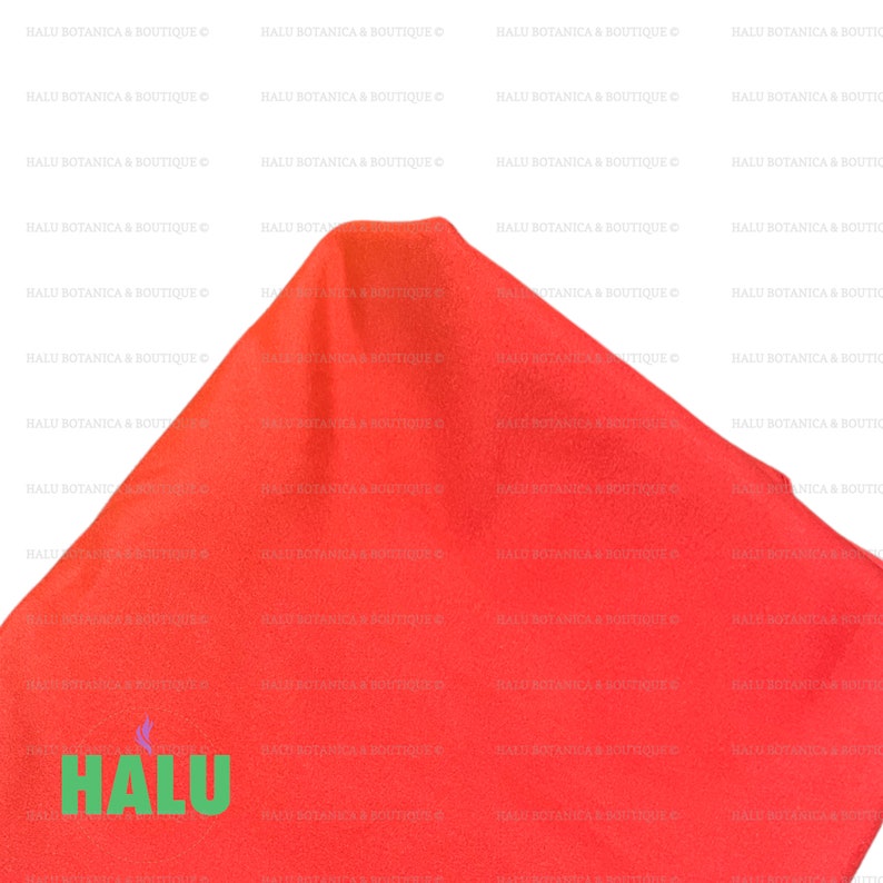 May include: A bright red fabric with the word "HALU" printed in green letters on the bottom left corner.