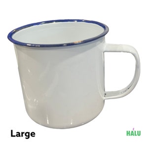 May include: White enamel mug with a blue rim and a large handle. The mug is labeled "Large".