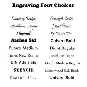 May include: A white background displays a list of engraving font choices. The text "Engraving Font Choices" is at the top. Various font styles are shown, including script, bold, and sans-serif options, such as "Dancing Script" and "Univers Bold".