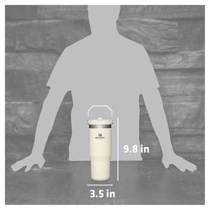 May include: A white stainless steel travel mug with a black handle and lid. The mug is 9.8 inches tall and 3.5 inches wide. The mug has the Stanley logo on the side.