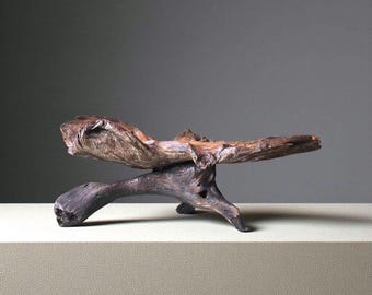 Escultura de madera flotante única con forma elevada, arte orgánico en madera