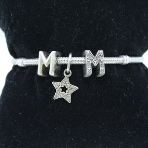 Authentic Pandora Sterling Silver Bracelet With 3 Charms