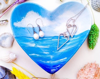 Blue skies heart shaped jewellery trinket dish. Ring dish.   Watch dish. Ceramic. Hand painted with acrylic paint. Coastal, sea scape, ocean