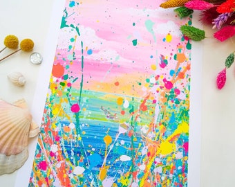 Giclee print of my original rainbow splash painting. Features a sunset seascape with pink sky, clouds, blue green sea & rainbow splashes