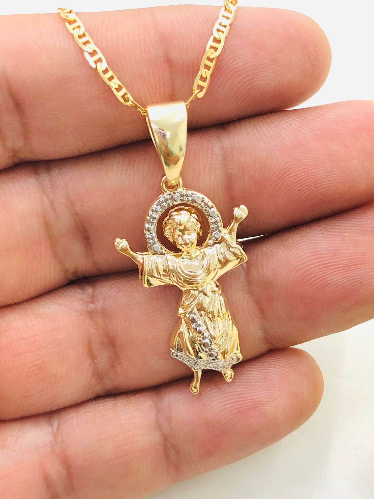 Divino nino gold best sale necklace