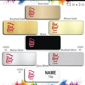 May include: A set of six name badges featuring the Red Roof Inn logo in red on different colored backgrounds. The backgrounds include rose gold, brushed gold, mirror gold, black, mirror silver, and brushed silver. The badges are 1.5 inches by 3 inches. The badges are labeled with the color and logo number.