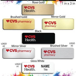 May include: A collection of customizable name badges for CVS employees. The badges are available in various colors and finishes, including rose gold, brushed gold, mirror gold, black, mirror silver, brushed silver, and gloss white. The badges feature the CVS logo and the text "CVS Health" or "CVS pharmacy". The badges are 1 inch by 3 inches.