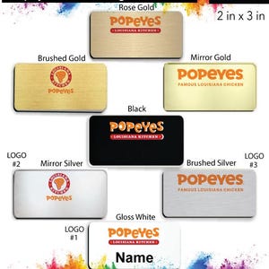 May include: A variety of name badge designs for Popeyes Louisiana Kitchen. The badges are available in brushed gold, rose gold, mirror gold, black, mirror silver, and brushed silver. The badges are 2 inches by 3 inches and come with a free pin back.