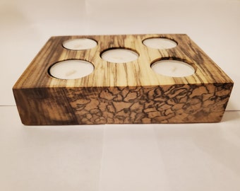 Tea light candle holder