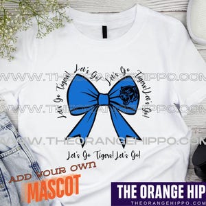 May include: White t-shirt with a blue bow and the text "Let's Go Tigers! Let's Go!"  Add your own mascot.