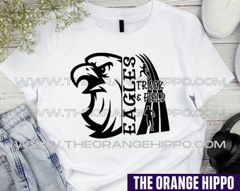 May include: White t-shirt with a black graphic design of an eagle and a runner with the text "Eagles Track & Field" on a white background.