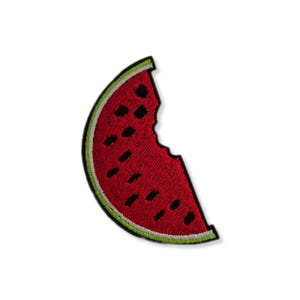 May include: A red watermelon slice with a bite taken out of it. The watermelon is embroidered with green and white outlines.